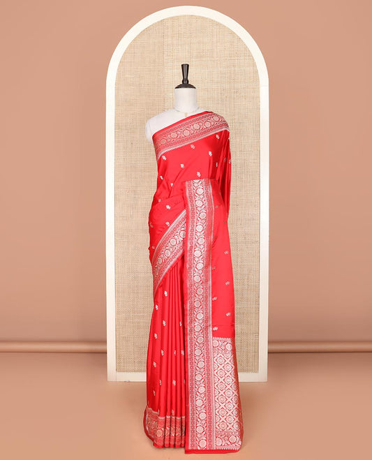 Red buttas mushru silk saree, traditional border of floral creeper designs, and zari-rich jaal pallu