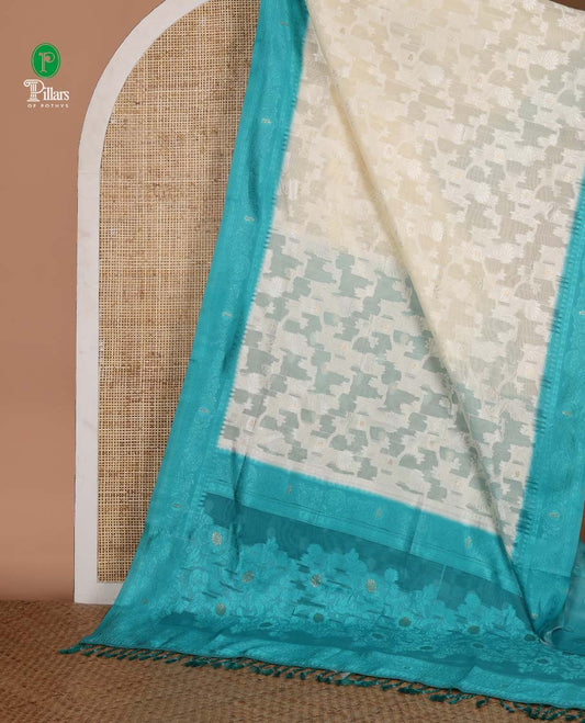Cream with rama color thread weaving, zari butta banaras brasso saree with contrast thread border & thread weaving pallu along with butta design blouse