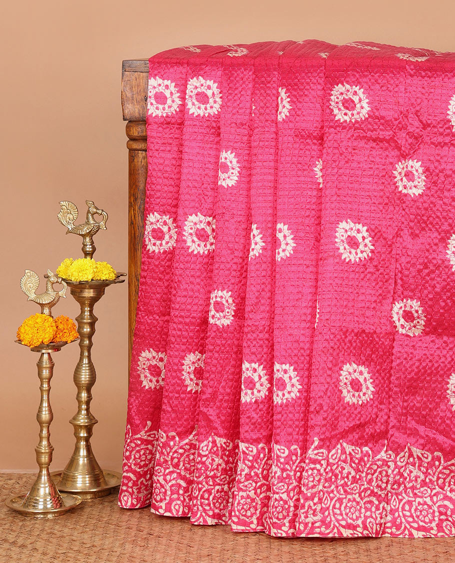 Rani pink batik-floral buttas printed Litchi crushed saree, batik-floral printed border, printed pallu & butta print blouse