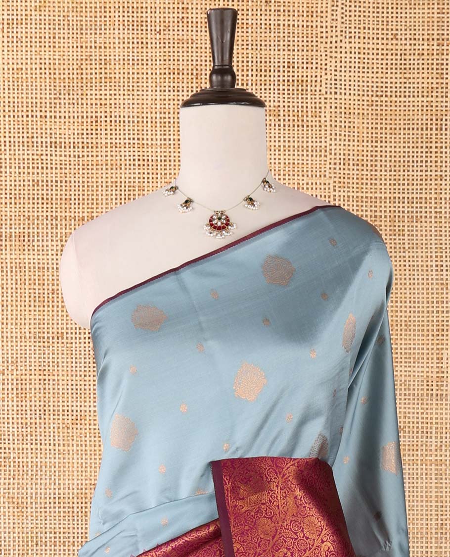 Borderless grey-purple zari buttas & half-&-half vanasingari-style flora-fauna woven kanchi silksaree,self-pallu & blue blouse of zari brocade