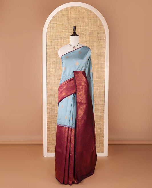 Borderless grey-purple zari buttas & half-&-half vanasingari-style flora-fauna woven kanchi silksaree,self-pallu & blue blouse of zari brocade