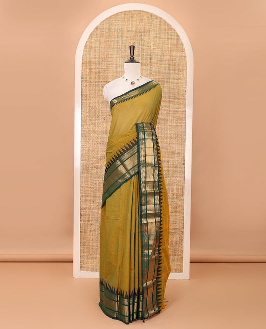 Mehendi green plain Chettinad cotton saree, contrast temple traditional zari design border, striped pallu & matching plain zari border blouse