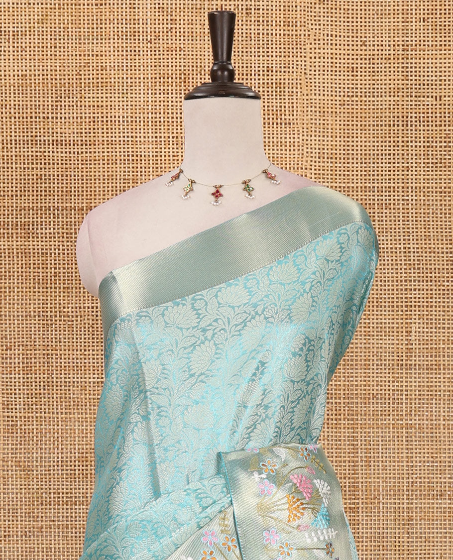 Sea green floral jaal jacquard celebrity tissue saree, zari border of multi-color floral motifs embroidery, jaal pallu & brocade blouse