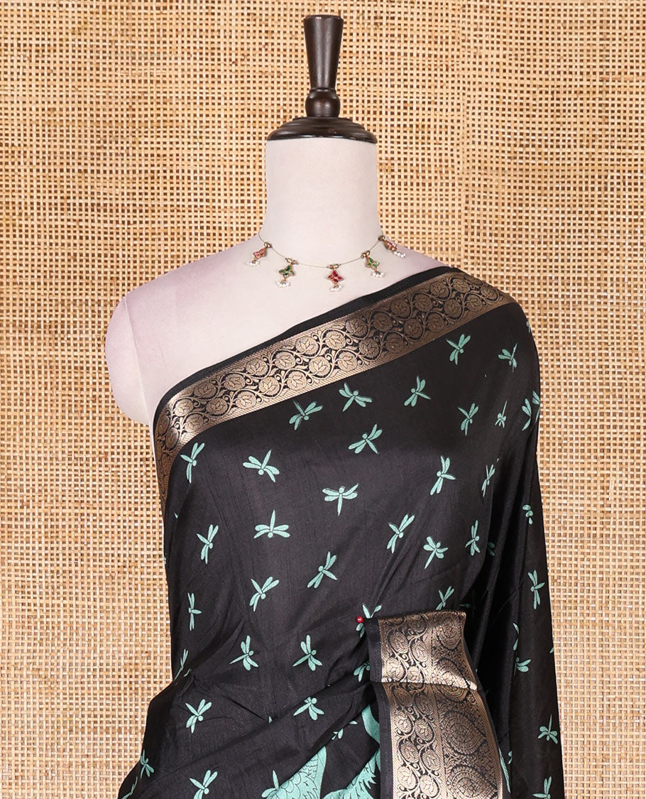 Black-Rama green dargon fly and cranes motifs printed dola silk saree, contrast gold zari border, Mughal floral printed pallu, and dragon fly printed blouse