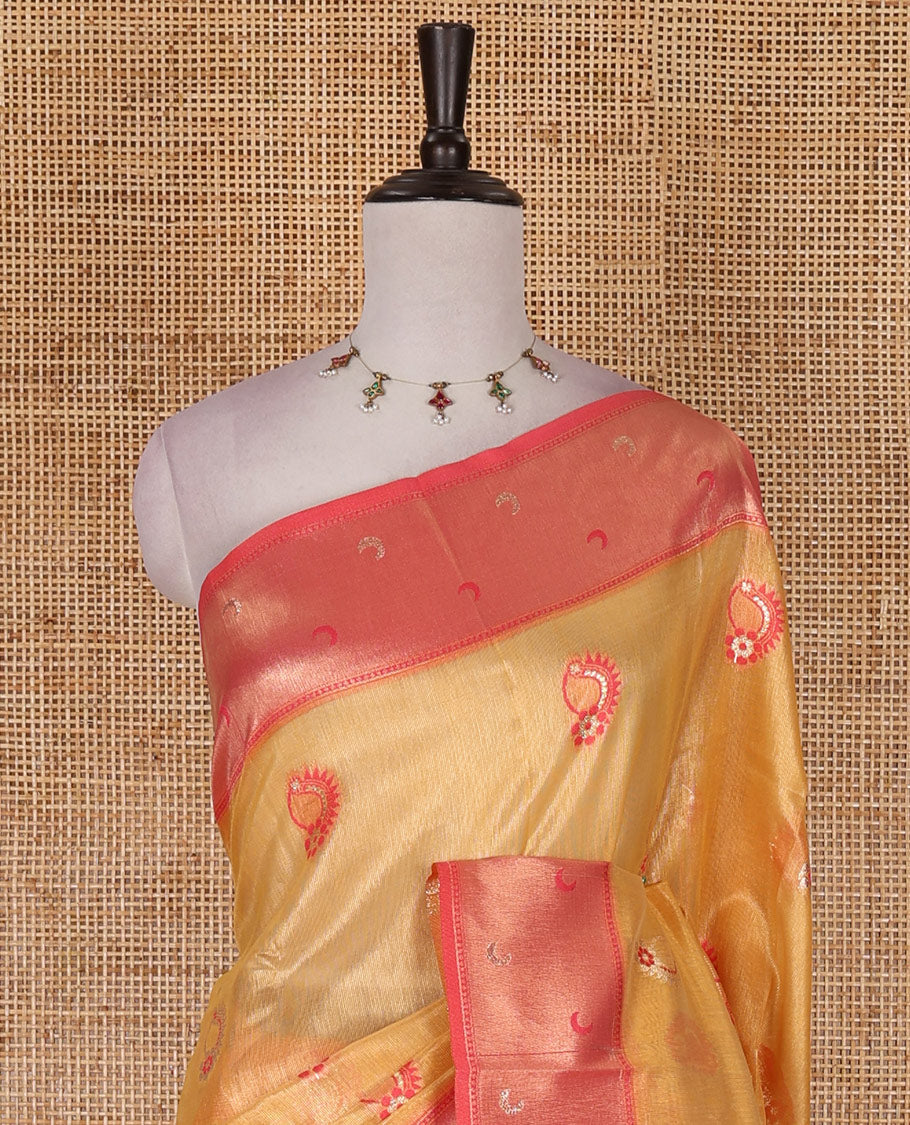 Yellow antique buttas tissue silk saree, contrast satin zari border of half-moon motifs, pallu of temple design pallu, and contrast butta blouse