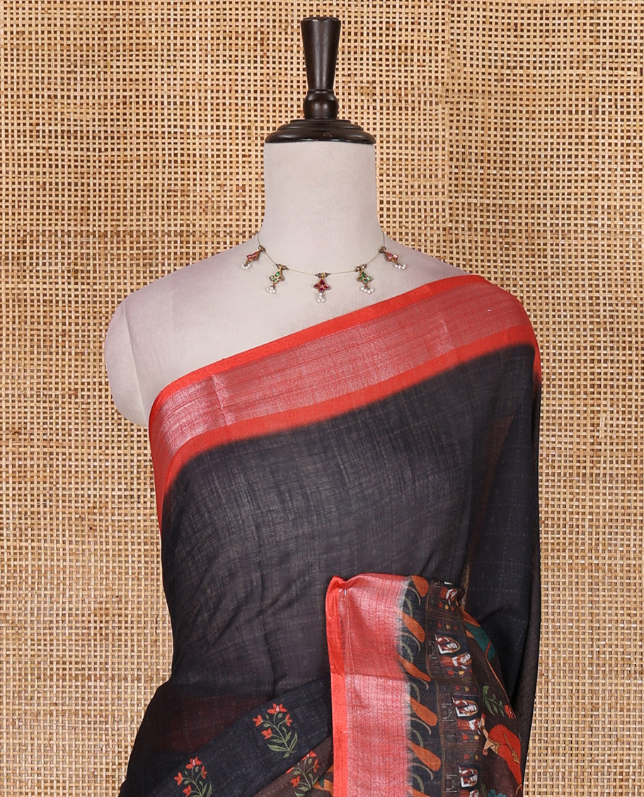 Black floral and human figurines printed linen cotton saree, contrast plain bavanji border, printed pallu, and contrast plain blouse