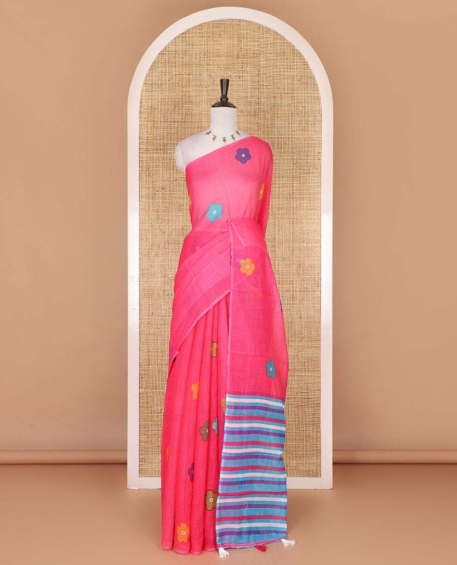 Borderless pink colorful five-petal flower motifs printed linen cotton saree, multi-color striped pallu, and contrast printed blouse