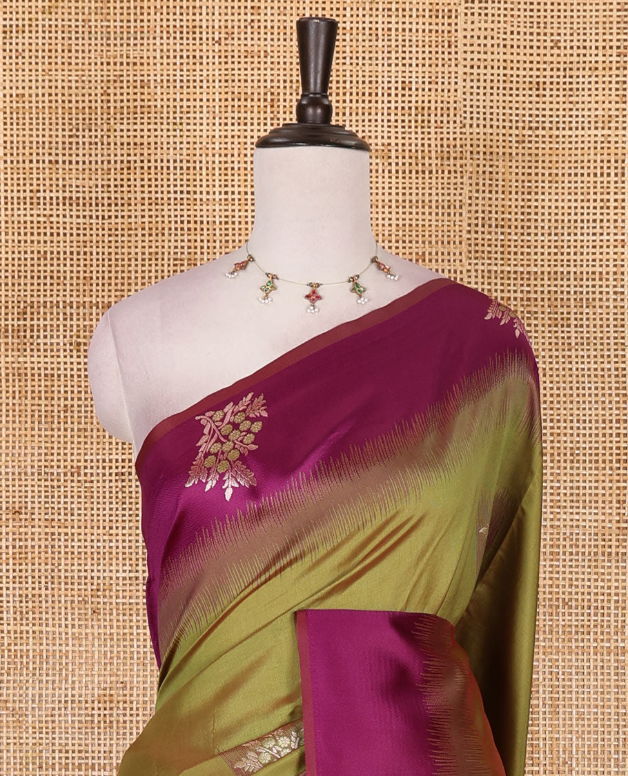 Green-purple floral buttas elite soft silk saree, contrast floral buttas border, and pallu of Mughal-style intricate zari designs