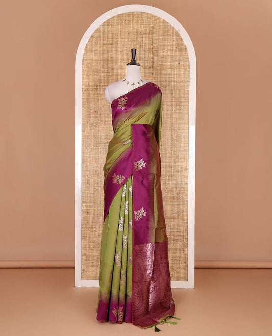 Green-purple floral buttas elite soft silk saree, contrast floral buttas border, and pallu of Mughal-style intricate zari designs