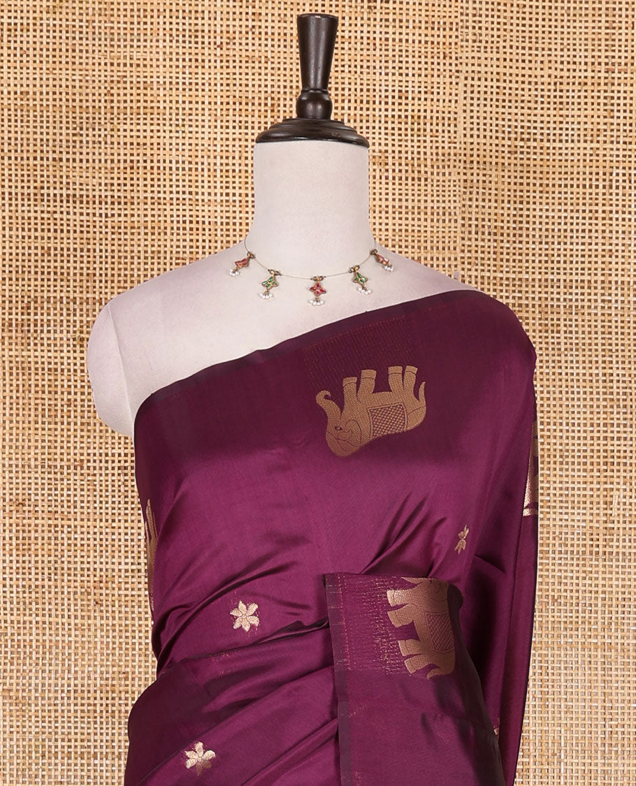 Borderless wine floral and elephant buttas zari woven kanchi silk saree, intricate pallu, and matching zari design blouse