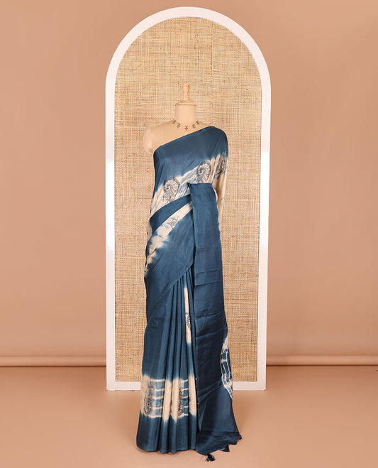 Borderless blue shibori printed with shell motifs, blockprinted Manipur tussar saree, shibori printed pallu, and a plain matching blouse