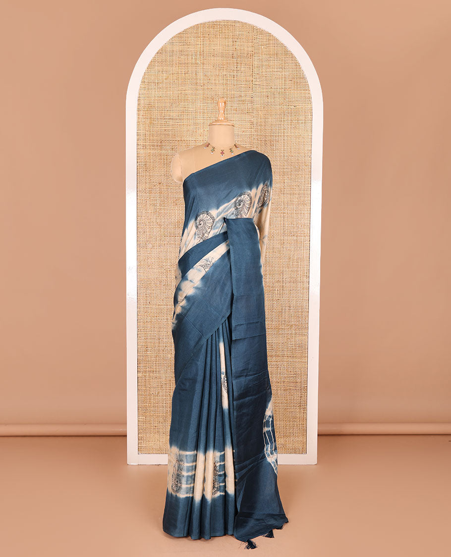 Borderless blue shibori printed with shell motifs, blockprinted Manipur tussar saree, shibori printed pallu, and a plain matching blouse