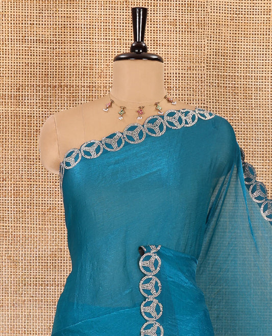 Blue plain fendy chiffon saree, scallop micro stone border, intricate stone work pallu, and a matching micro-stone blouse