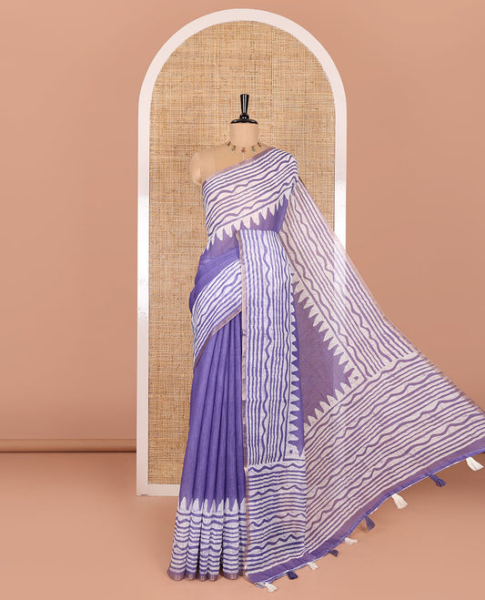 Lavender plain linen cotton saree, temple zig-zag striped batik printed border, batik printed pallu, and triangle motifs batik printed blouse
