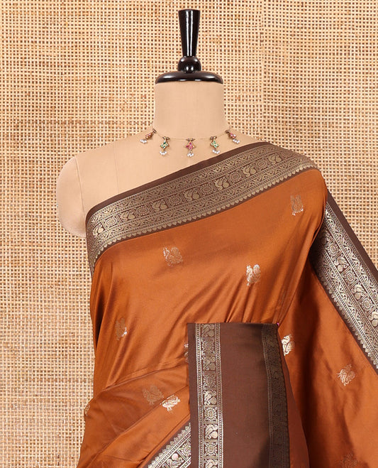 Rust orange peacock zari buttas kanchi soft-silk saree, contrast traditional zari design rettai pettu border, zari-rich intricate pallu, and a contrast zari design blouse