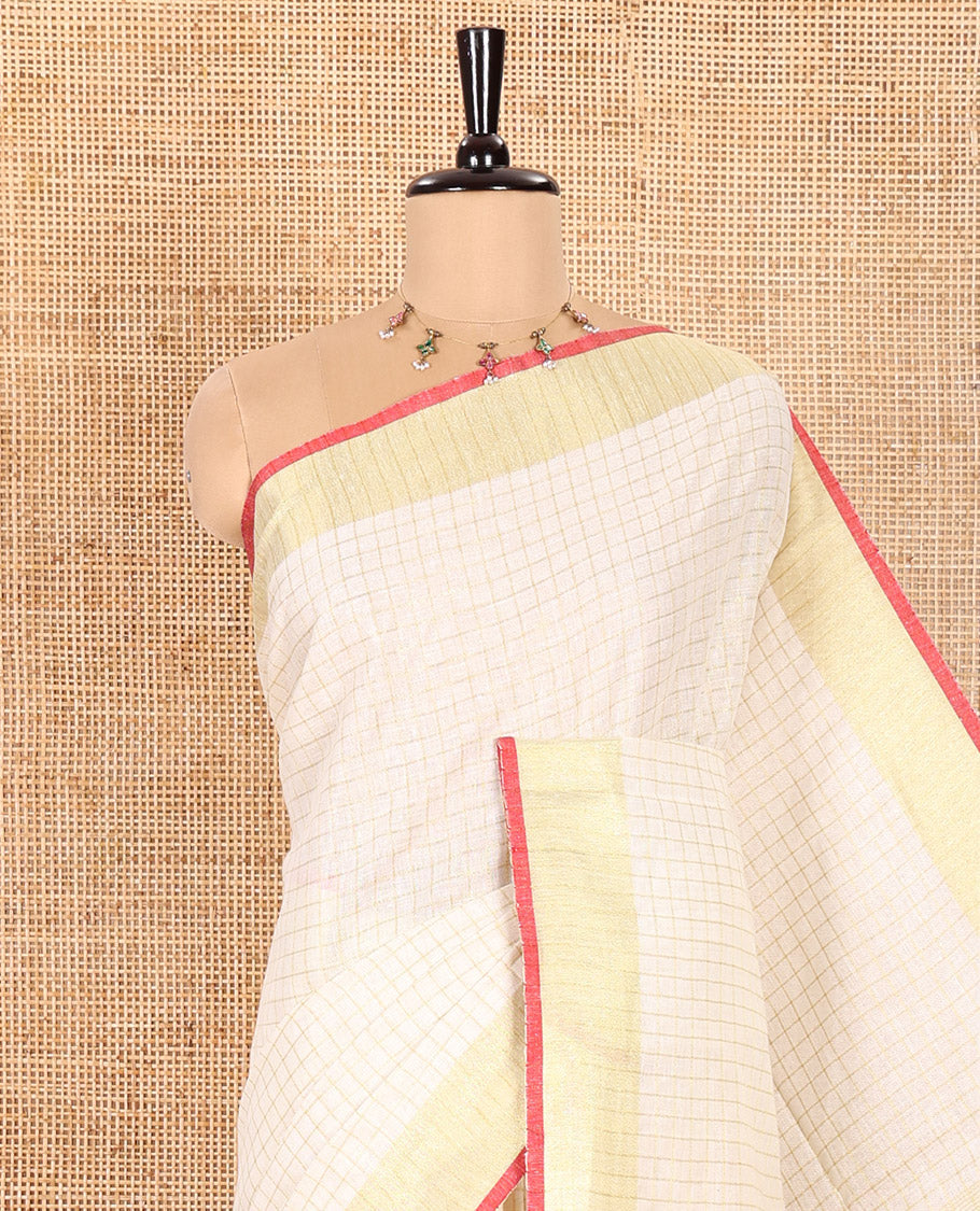 Cream and Red Linen Saree Sparsely Sparkled with Checks, Subtly Designed Zari Border, Zari Striped Pallu, and Paired with a Contrast Blouse