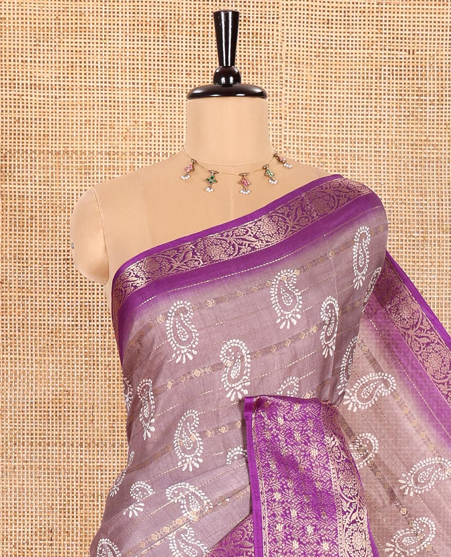 Mauve Dola Silk Saree Elevated with Paisley Buttas, and Horizontal Zari Stripes All Over Its Body, Complemented by Contrast Floral Creeper Zari Design Border, Pallu Steeped with Paisleys, and Paired with a Contrast Blouse