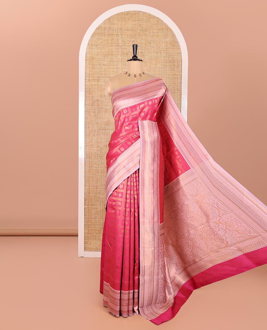 Rani Pink Kanchi Silk Saree Enriched with Butta Enclosed Checks All Over Its Body, Complemented by Contrast Traditional Zari Design Border, Gracefully Embellished Pallu, and Paired with a Contrast Brocade Blouse