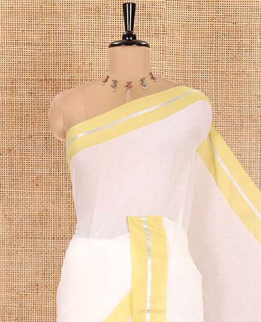 Cream and Liril Green Plain Khadi Mul Cotton Saree, Complemented by Contrast Horizontal Striped Border, Plain Pallu, and Paired with a Matching Blouse