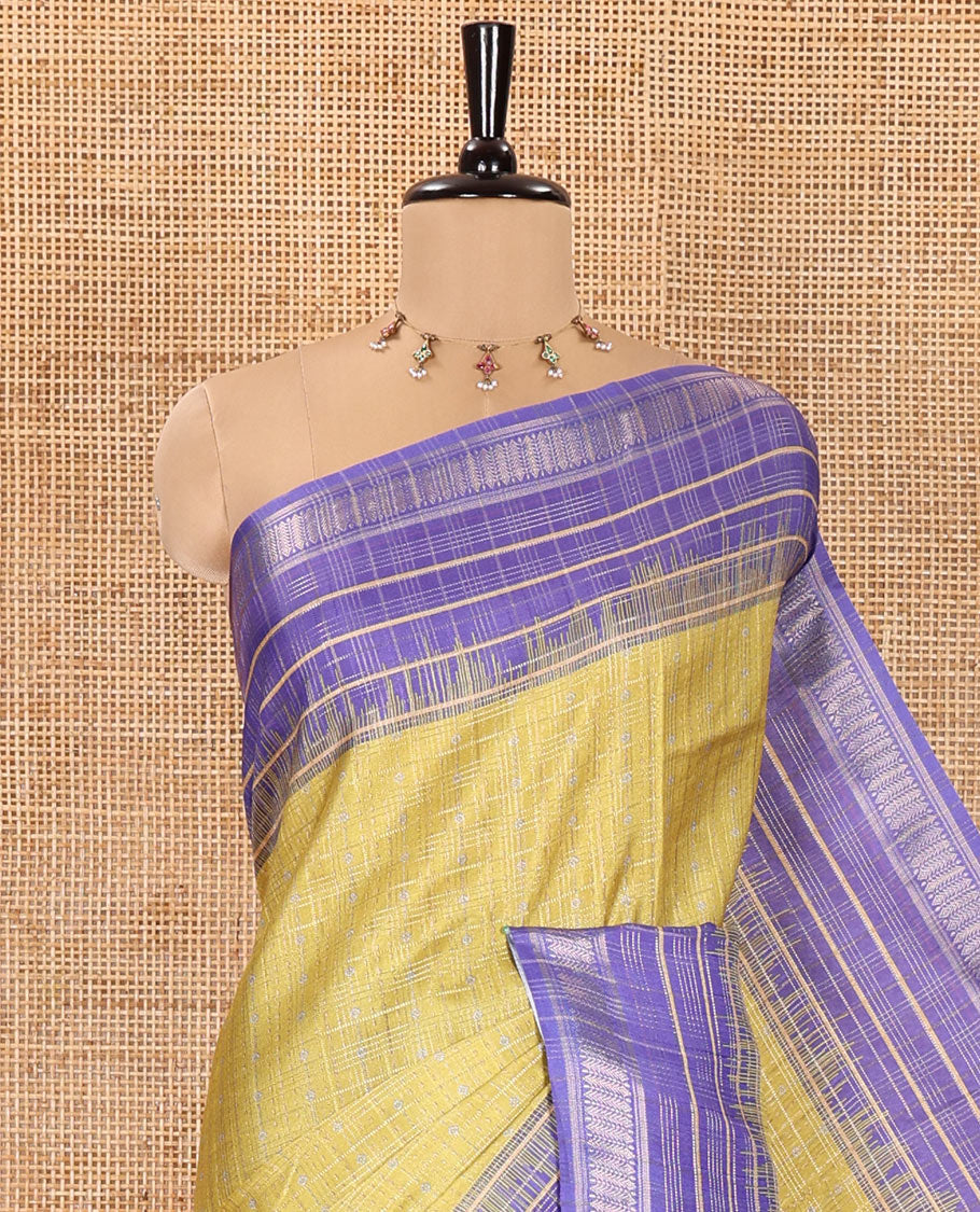 Green Manipuri Silk Saree, Subtly Sparkled with a Checked Design on Its Body, Complemented by a Contrast Zari Checked Border, Pallu Pictures Floral Jaal Designs, and Paired with a Contrast Blouse
