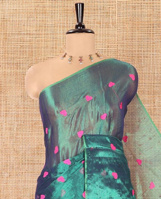 Borderless Green Tissue Mul Cotton Saree, Artfully Designed with Heart Motifs Embroidered on Its Body,  Pallu Mirrors the Same Embroidery, and Is Paired with a Matching Blouse