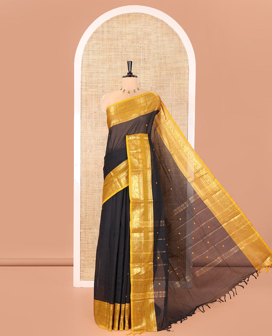 Black Chettinad Cotton Saree, Adorned with Buttas All Over Its Body, Complemented by a Contrast Traditional Zari Rettai Pettu Border, Pallu of Stripes and Buttas, and Paired with a Matching Blouse