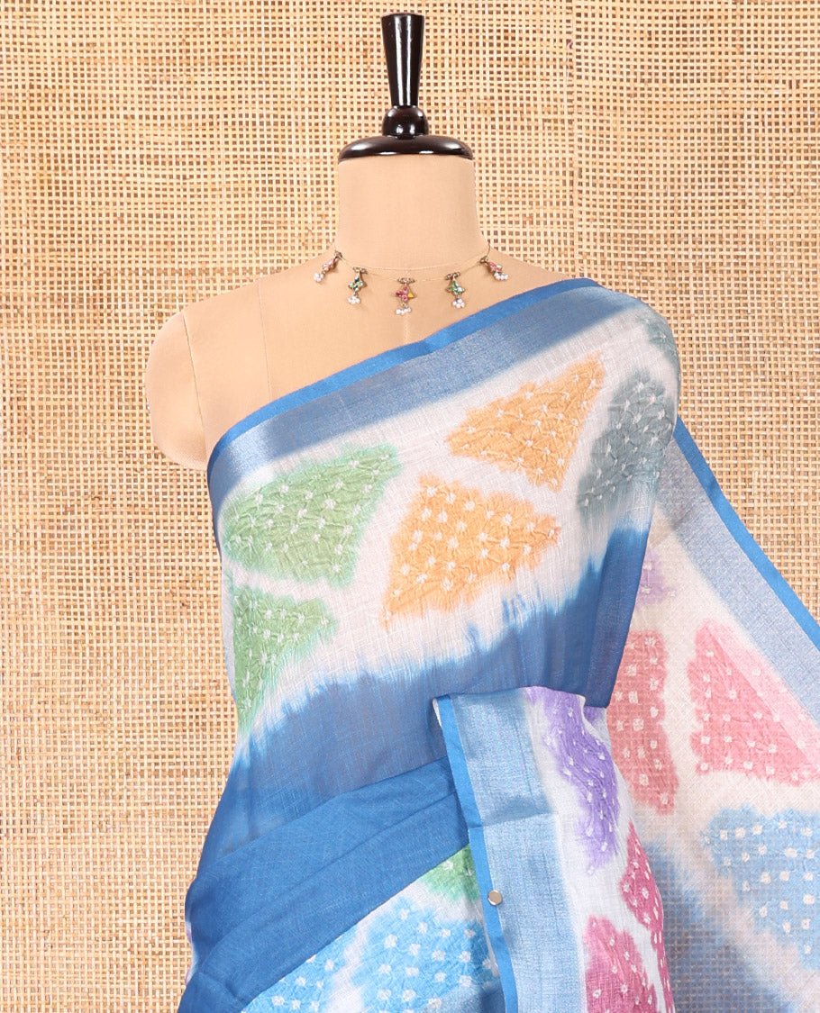 Blue Plain Linen Cotton Saree, Highlighted by a Colorful Bandhani Printed Zari Border, Pallu of Bandhani Print, and Paired with a Matching Bandhani Printed Blouse