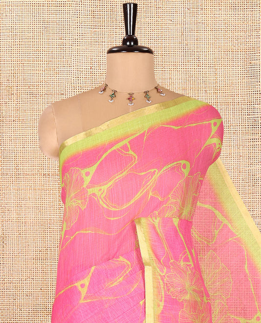 Rani Pink Linen Cotton Saree, Accentuated with Abstract Floral Print On Its Body, Subtle Piping Border, Pallu of Floral and Geometric Print, and Paired with a Contrast Blouse
