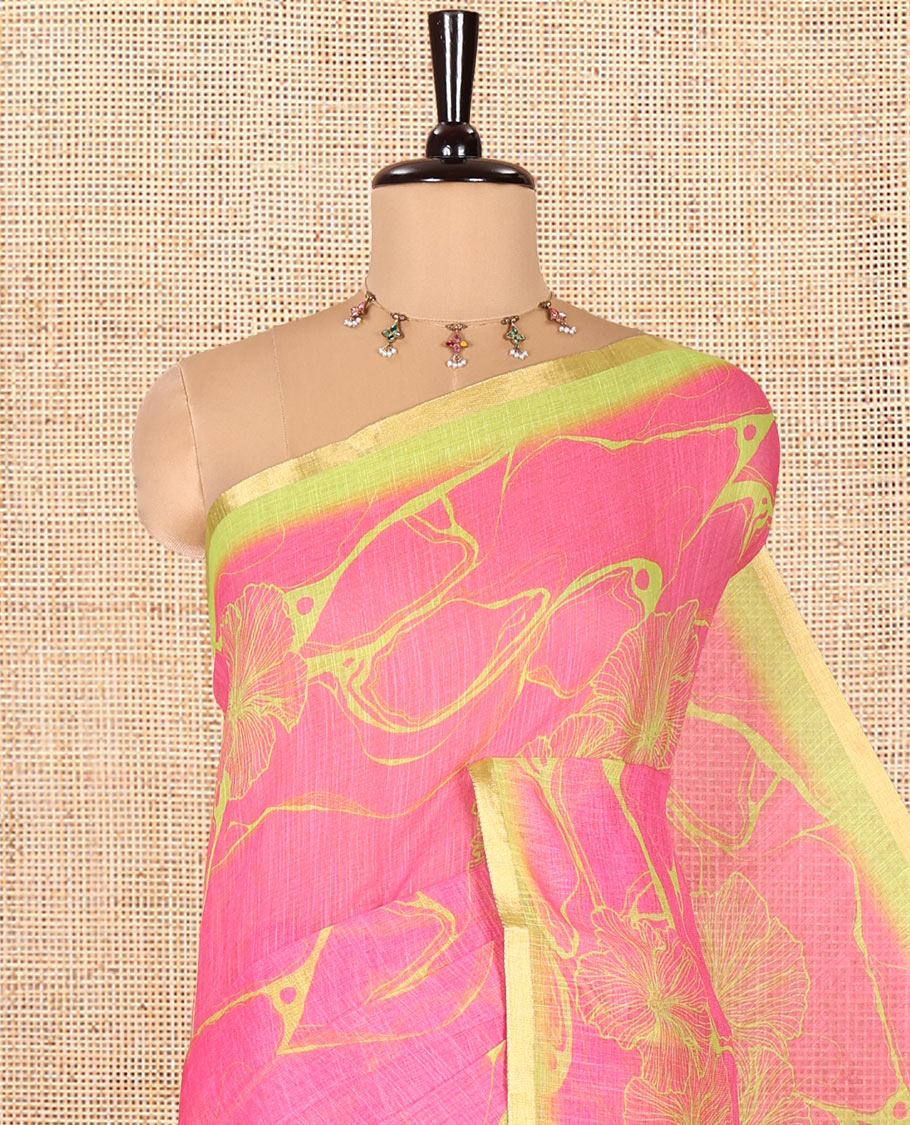 Rani Pink Linen Cotton Saree, Accentuated with Abstract Floral Print On Its Body, Subtle Piping Border, Pallu of Floral and Geometric Print, and Paired with a Contrast Blouse