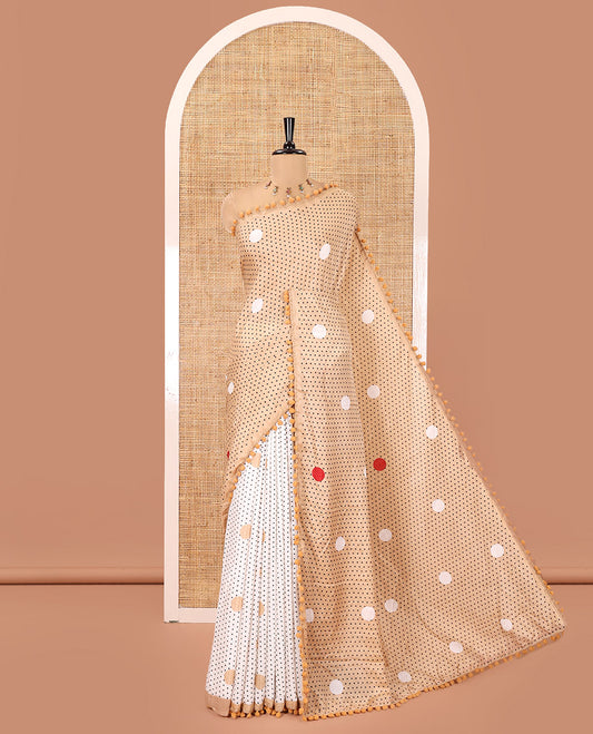 Chikku Chanderi Cotton Saree, Steeped with Small and Big Polka Dots on Its Body, Subtle Pom-Pom Tasseled Border, a Self-Pallu, and Paired with a Contrast Blouse