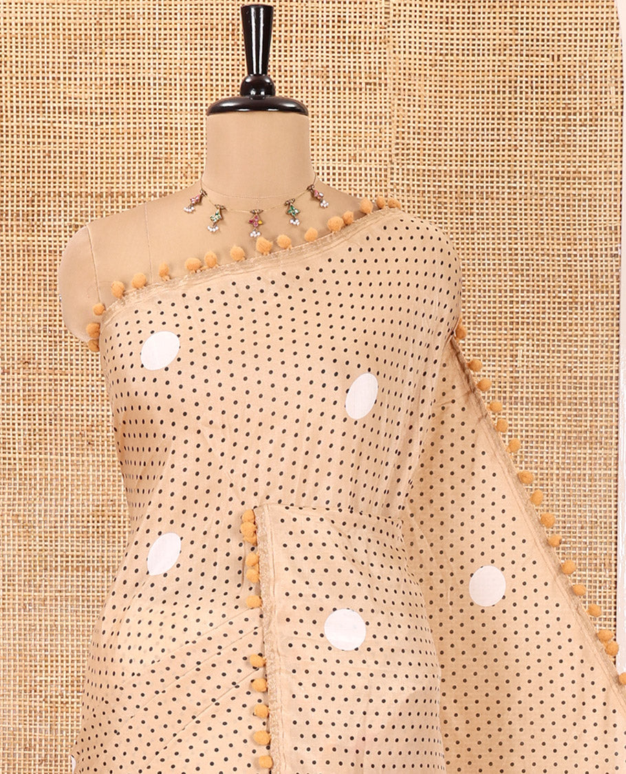 Chikku Chanderi Cotton Saree, Steeped with Small and Big Polka Dots on Its Body, Subtle Pom-Pom Tasseled Border, a Self-Pallu, and Paired with a Contrast Blouse