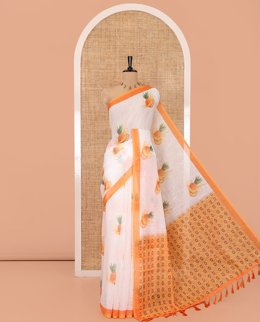 White Linen Cotton Saree, Artfully Printed with Pineapple Motifs All Over Its Body, Complemented by a Contrast Border, Geometric -Printed Pallu, and Paired with a Contrast Blouse
