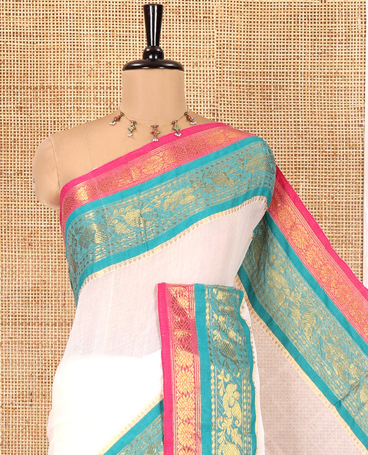 Cream Plain Khadi Mul Cotton Saree, Complemented by a Contrast Traditional Zari Border of Floral Creeper Designs, and a Matching Blouse