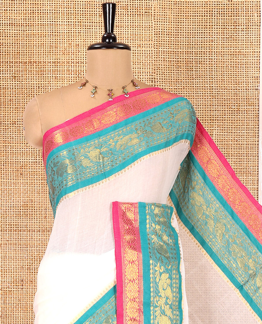 Cream Plain Khadi Mul Cotton Saree, Complemented by a Contrast Traditional Zari Border of Floral Creeper Designs, and a Matching Blouse