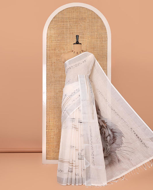 Cream Linen Cotton Saree, Subtly Sparkled with Ikkat-Style Print on Its Body, a Subtle Zari Border, Pallu of Big Tiger Picture Print, and Paired with a Matching Blouse