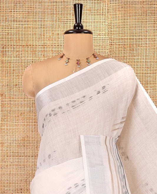 Cream Linen Cotton Saree, Subtly Sparkled with Ikkat-Style Print on Its Body, a Subtle Zari Border, Pallu of Big Tiger Picture Print, and Paired with a Matching Blouse