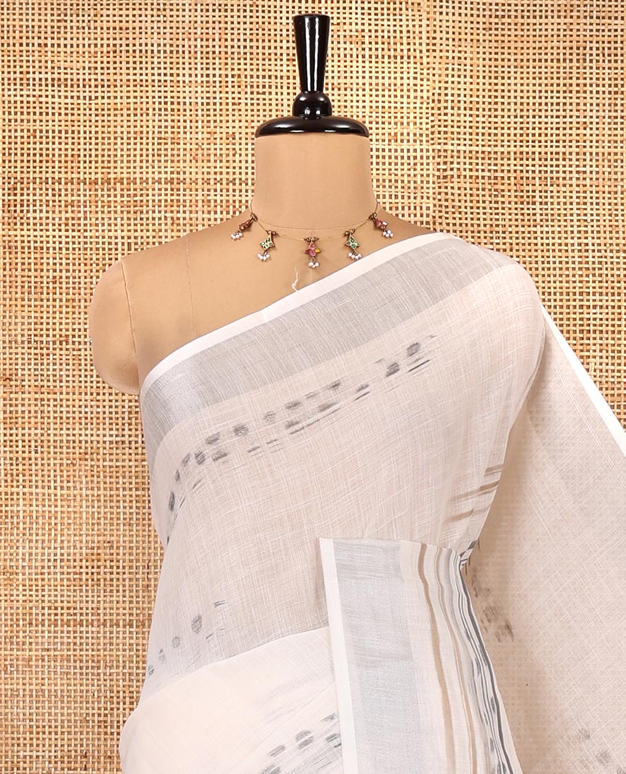 Cream Linen Cotton Saree, Subtly Sparkled with Ikkat-Style Print on Its Body, a Subtle Zari Border, Pallu of Big Tiger Picture Print, and Paired with a Matching Blouse