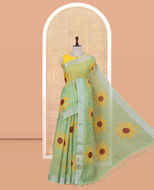 Green Linen Cotton Saree, Beautified with Sunflower Print, a Zari Border, and a Matching Blouse