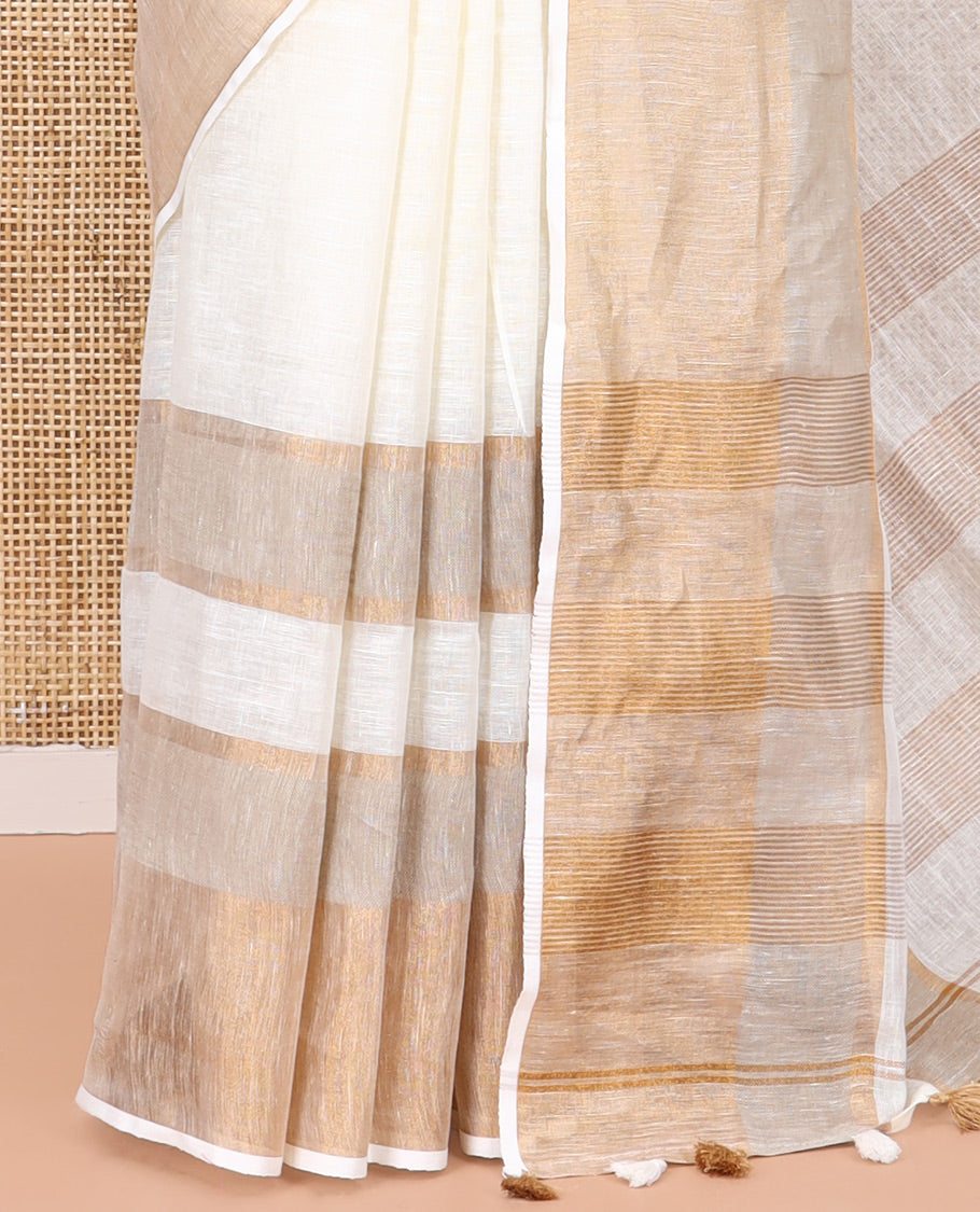 Cream Plain Linen Saree, a Contrast Zari Border, Zari Thick Striped Pallu, and a Matching Blouse