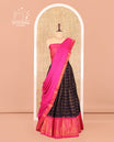 Navy Blue-Rani Pink Sungudi Cotton Half-Saree Features Checked Skirt, Contrast Gopuram Border, Contrast Blouse, and Zari-Bordered Syska Georgette Dhavani
