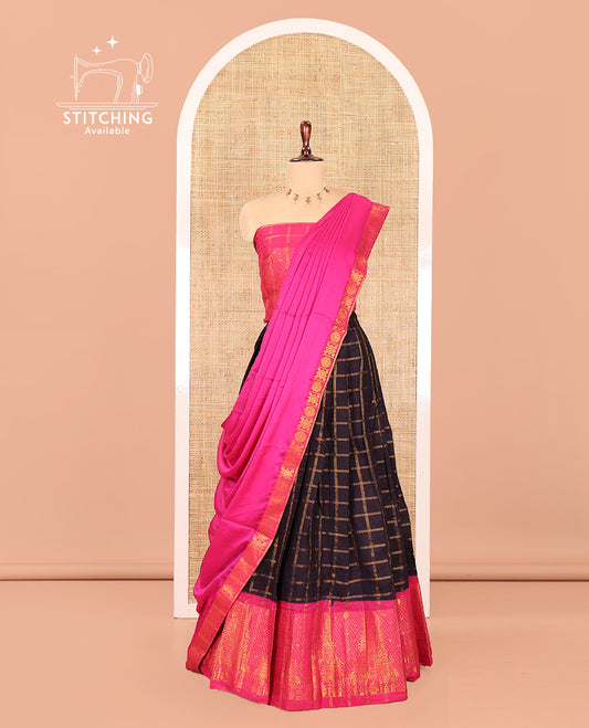 Navy Blue-Rani Pink Sungudi Cotton Half-Saree Features Checked Skirt, Contrast Gopuram Border, Contrast Blouse, and Zari-Bordered Syska Georgette Dhavani
