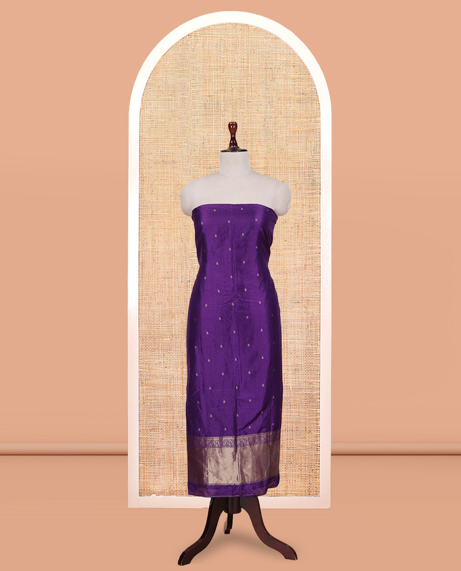 Purple Semi-Silk Material Churidar Features Zari Buttas Woven Top, a Santoon Bottom, and Zari Design Dupatta