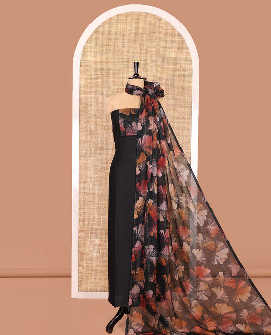Black Material Churidar Set, Spotlighted with Floral Printed Patch Embroidery Vichitra Silk Top, Comes with a Plain Santoon Bottom, and a Floral Printed Shimmer Georgette Dupatta