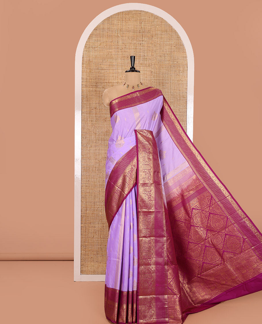 Lavender Kanchipuram Budget Silk Saree, Accentuated with Zari Buttas and Zari Stripes All Over Its Body, Complemented by a Contrast Traditional Zari Design Border, Zari-Rich Jaal Pallu, and Paired with a Contrast Blouse