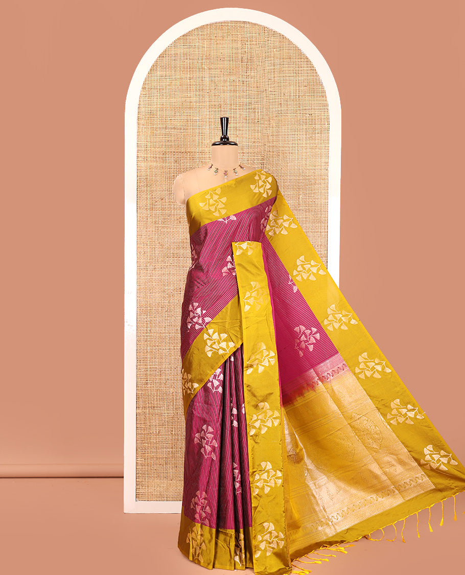 Majenta Semi-Soft Silk Saree, Highlighted by Vaira Oosai Stripes and Floral Buttas All Over Its Body, Complemented by a Contrast Floral Buttas Border, an Intricately Designed Pallu, and Paired with a  Contrast Blouse