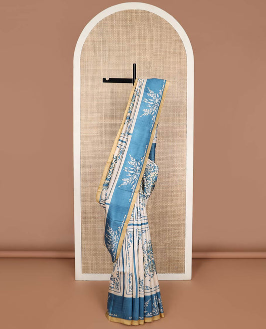 Cream with blue floral design printed silk saree with contrast border