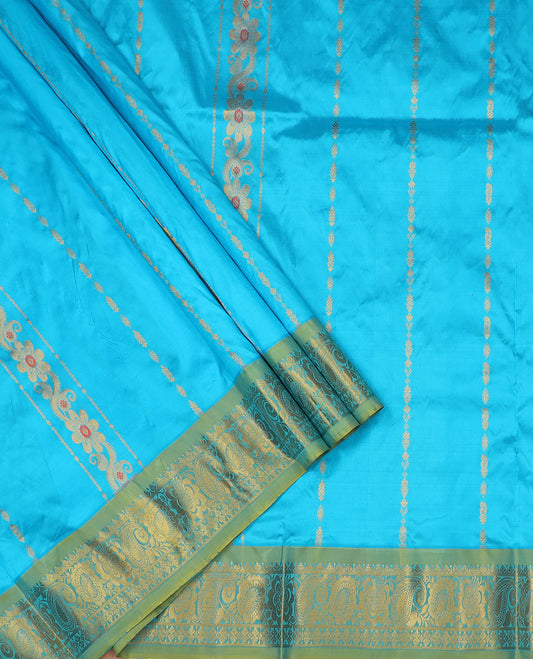 Blue Pure Silk Half-Saree Beautified with Floral Zari Designs on the Skirt, Complemented by a Contrast Zari-Design Border, Paired with a Contrast Blouse, and Featuring a Jaal-Designed Dhavani