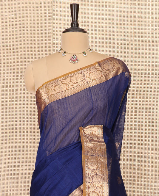 Blue Silk Cotton Saree Prettified with Buttas All Over the Body, Complemented by a Contrast Floral Creeper Zari Border, Featuring a Contrast Pallu of Floral Zari Designs, and Paired with a Contrast Blouse