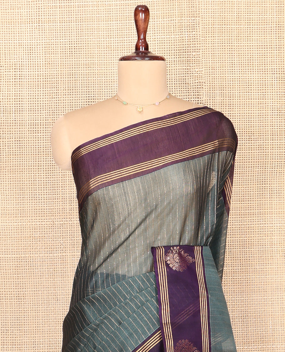 Grey Silk Cotton Saree, Subtly Sparkled With Stripes All Over Its Body Complemented by Contrast Zari Motifs Woven Border, Geometric Patterned Pallu and Paired with a Contrast Blouse
