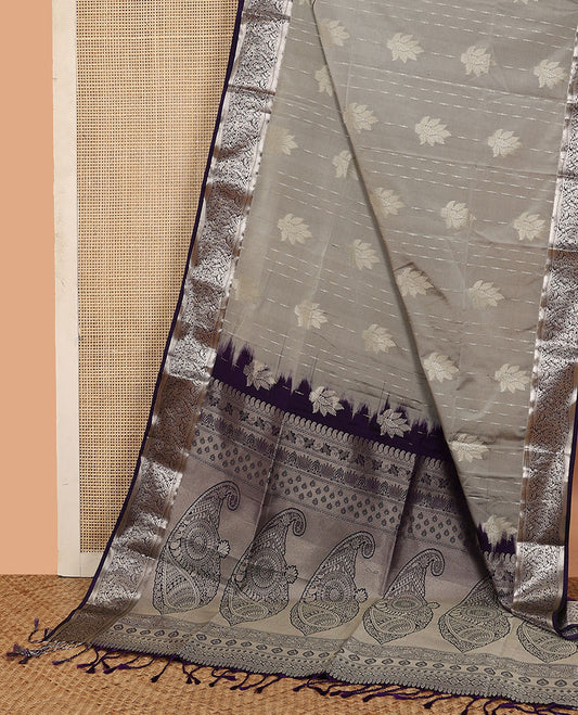 Grey stripes, and leaf buttas soft silk saree, contrast floral zari design border, and paisley design pallu